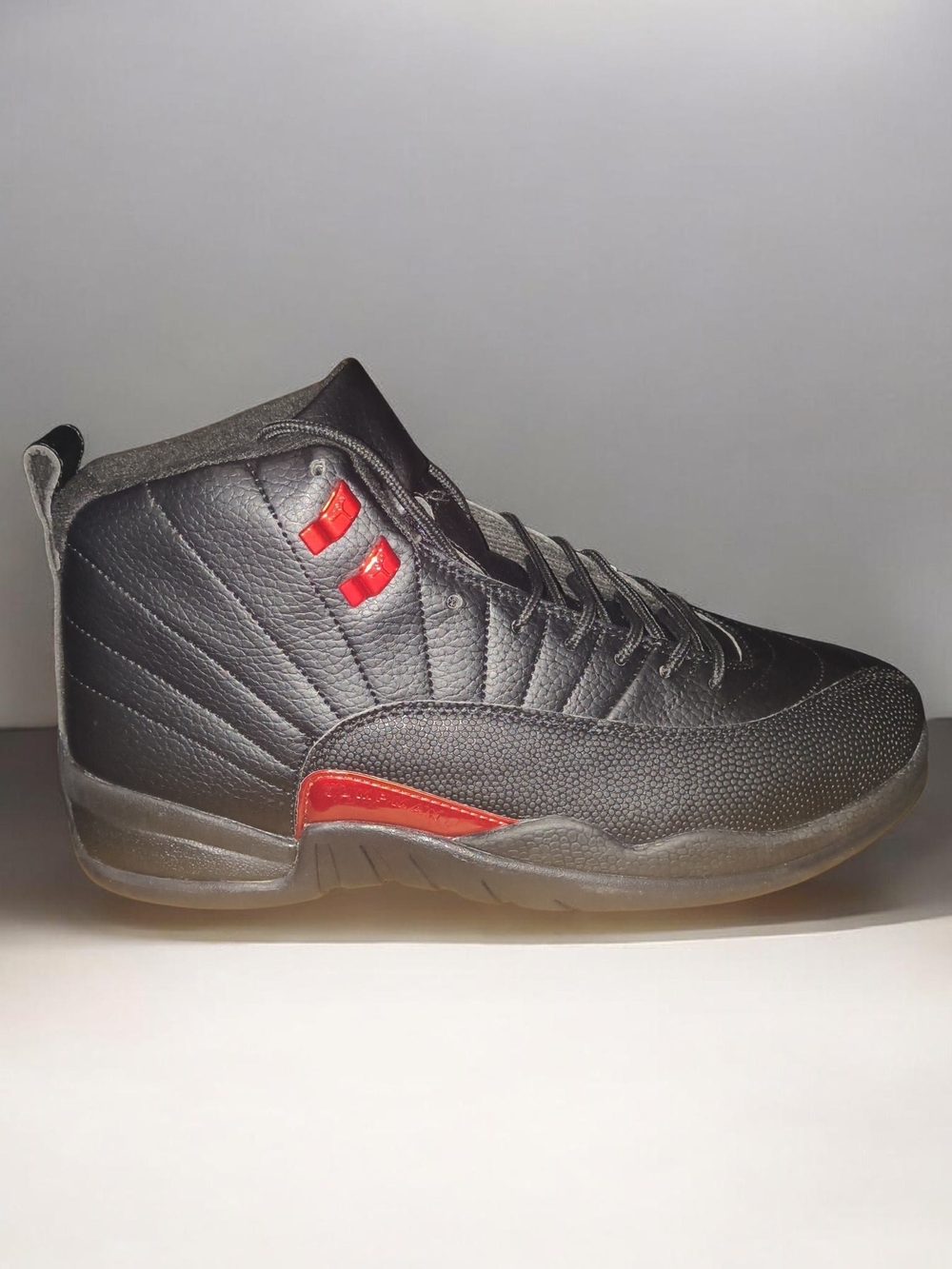 Jordan 11 Retro "Bloodline" Men's Black Athletic Sneakers with Red Accents